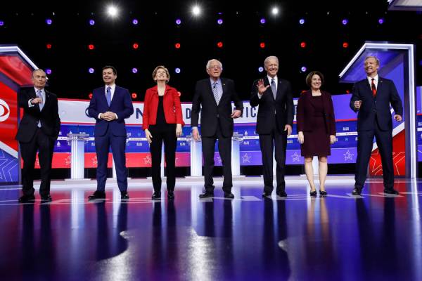 From left, Democratic presidential candidates, former New York City Mayor Mike Bloomberg, forme ...