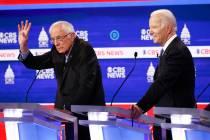 Democratic presidential candidates, Sen. Bernie Sanders, I-Vt., left, and former Vice President ...