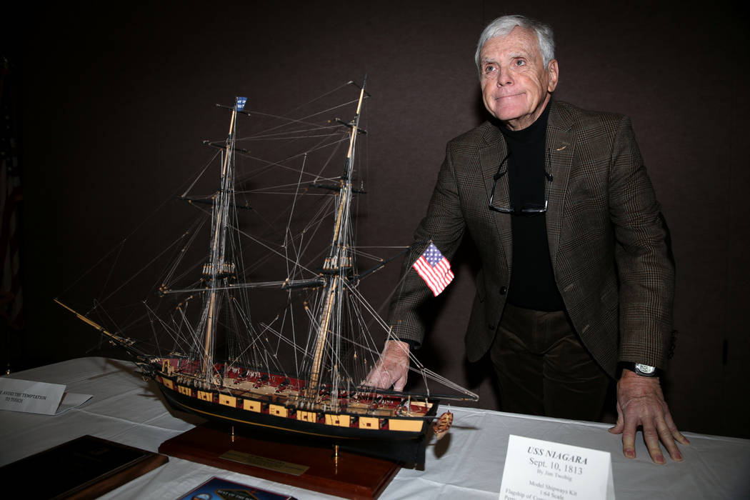 U.S. Air Force veteran Jim Twohig poses with the U.S. Brig Niagara ship model he completed afte ...