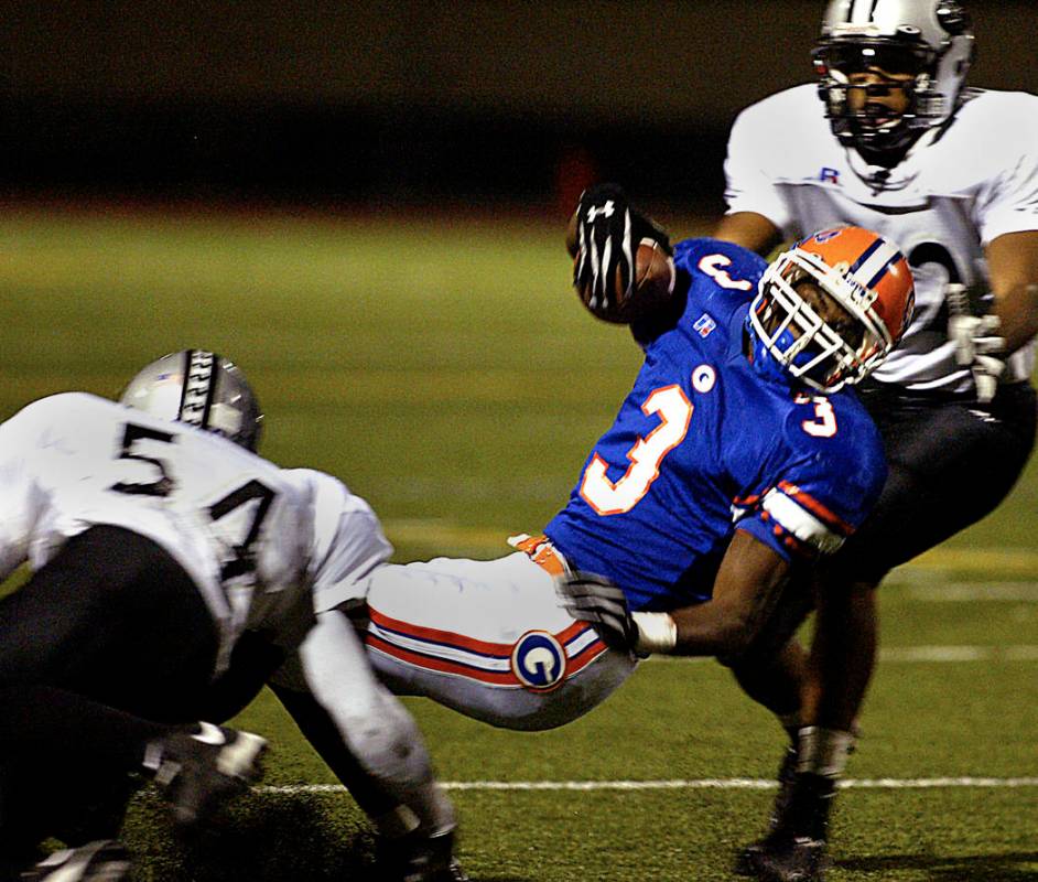 DeMarco Murray is tackled during his high school career at Bishop Gorman. (Review-Journal file ...