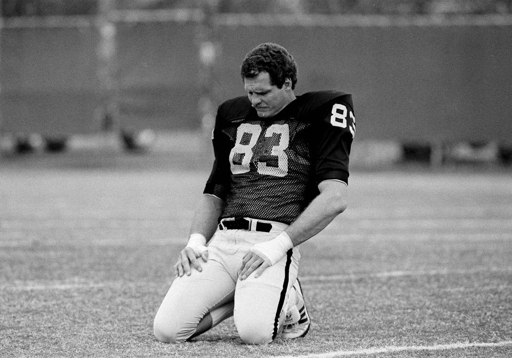 Los Angeles Raiders linebacker Ted Hendricks stretches during an exercise period at a Raiders p ...