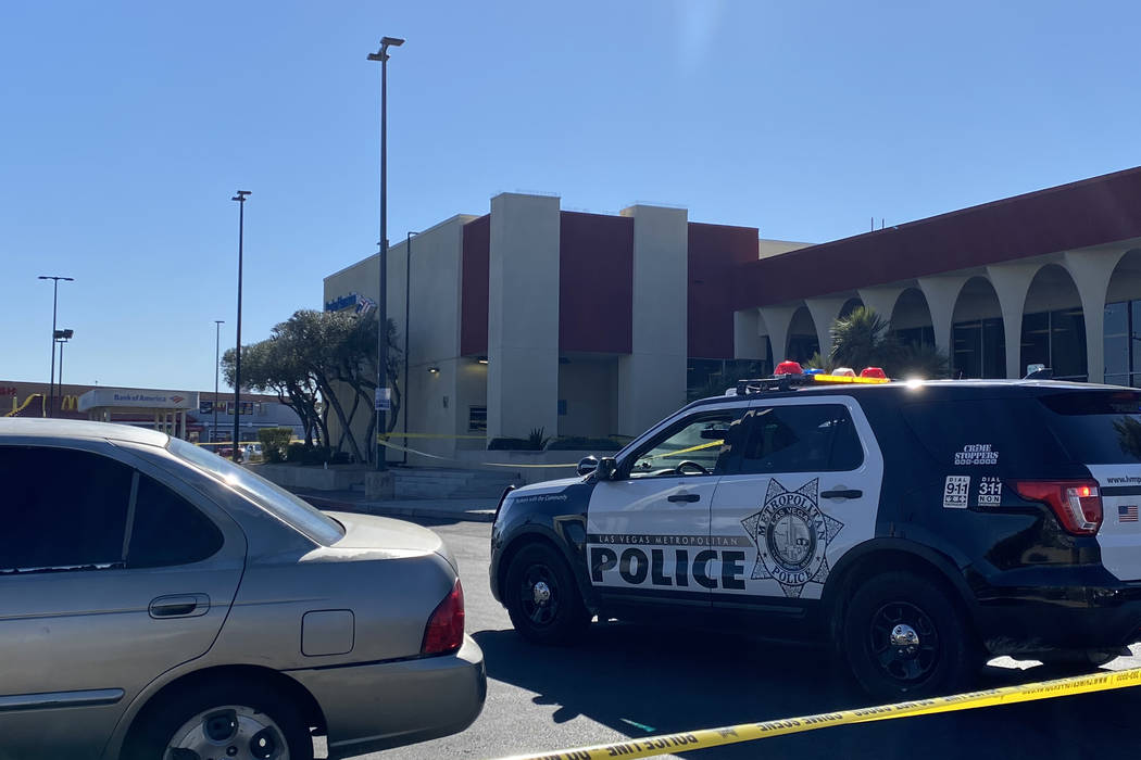 Las Vegas police investigate a shooting Thursday afternoon in southeast Las Vegas near the UNLV ...