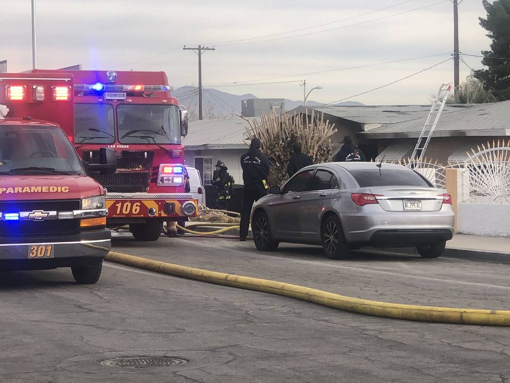 Firefighters battle a blaze at 1904 Leona Street on Friday, Feb. 28, 2020. (Katelyn Newberg/Las ...