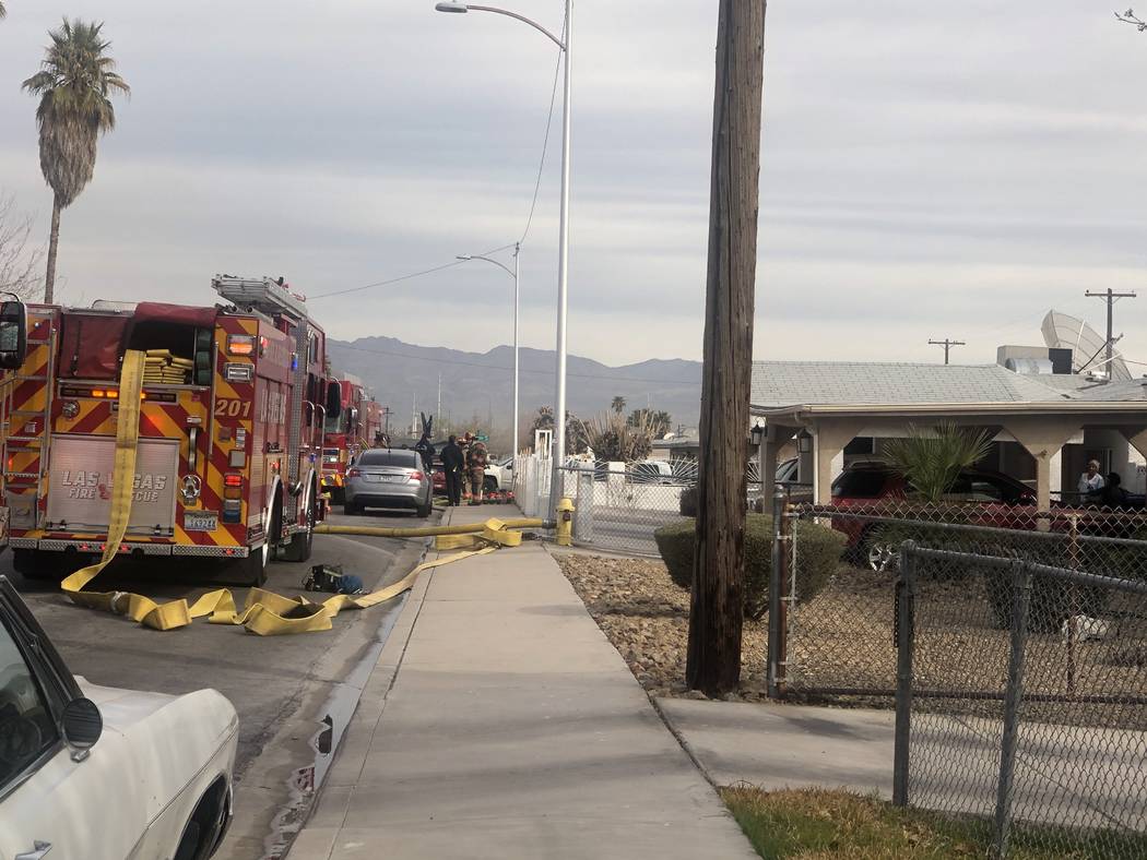 Firefighters battle a blaze at 1904 Leona Street on Friday, Feb. 28, 2020. (Katelyn Newberg/Las ...