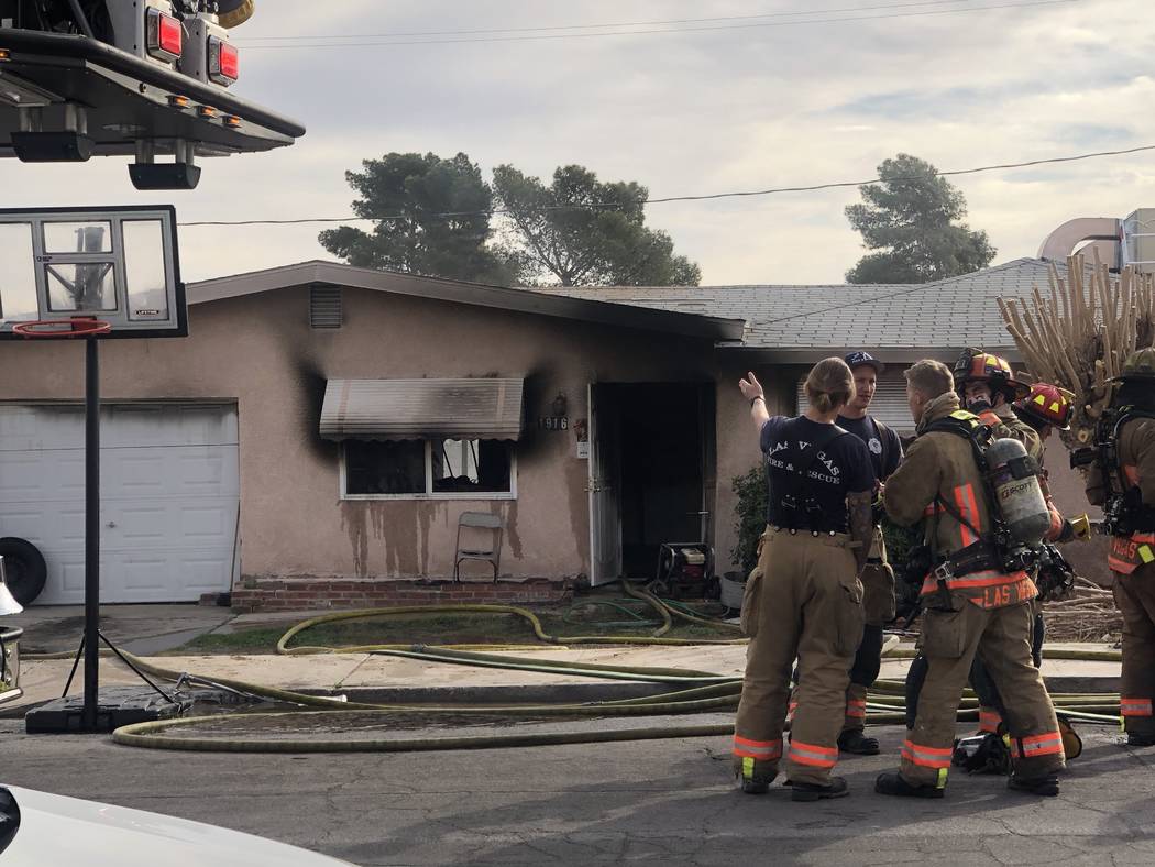 Firefighters battle a blaze at 1904 Leona Street on Friday, Feb. 28, 2020. (Katelyn Newberg/Las ...