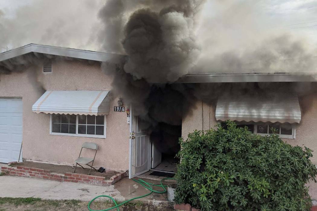 Firefighters battle a blaze at 1904 Leona Street on Friday, Feb. 28, 2020. (Las Vegas Fire Depa ...