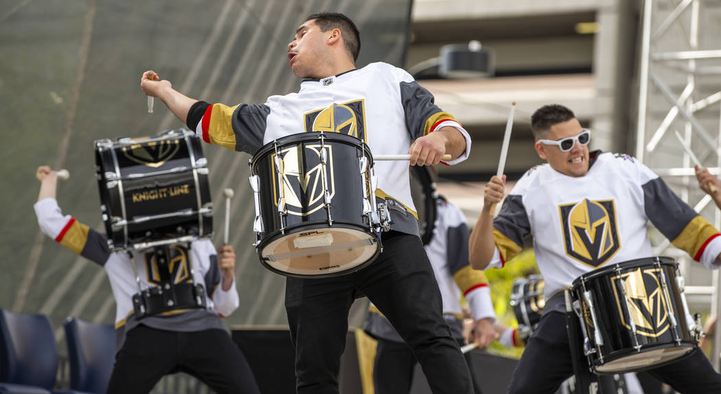 The Knight Line perform for the crowd during the Vegas Golden Knights Fan Fest at the Downtown ...