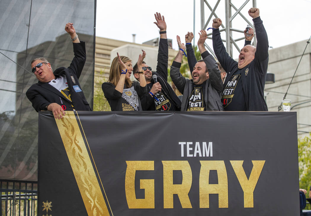 Team Gray celebrates their first round win during a game of Knight Family Feud on stage during ...