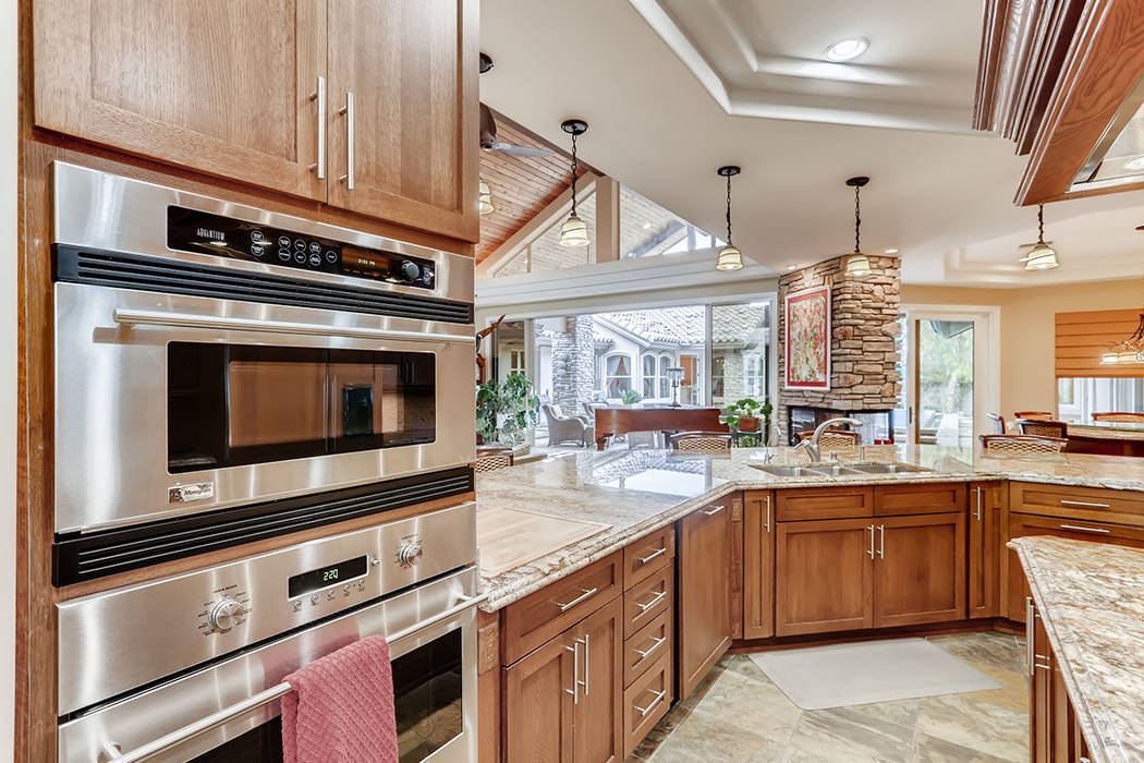 The kitchen has upgraded appliances. (Berkshire Hathaway HomeServices)