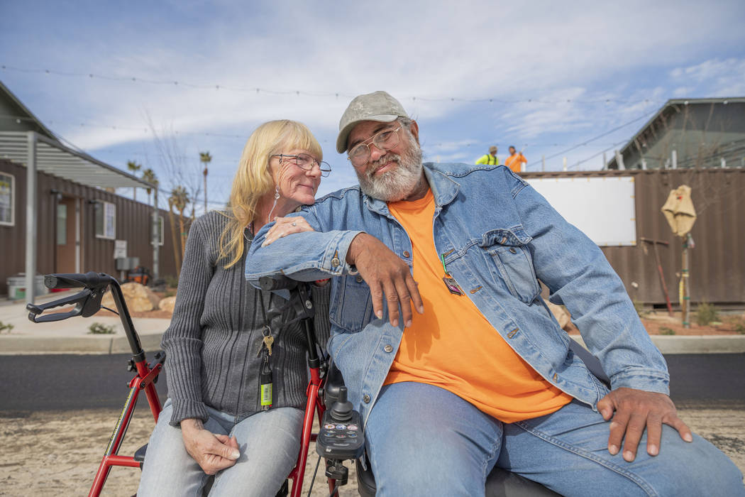 Donna Charles, 65, left, and Robert Caris, 63, an engaged couple that are photographed in front ...