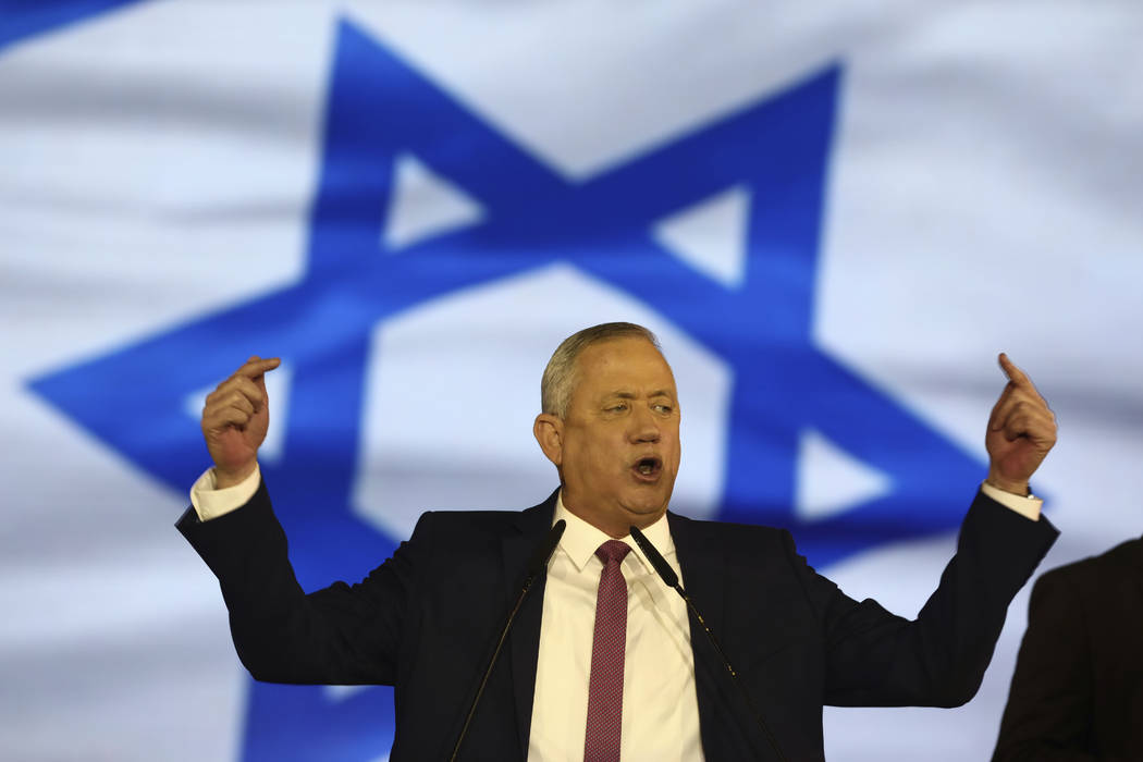 Blue and White party leader Benny Gantz addresses his supporters during election campaign rally ...