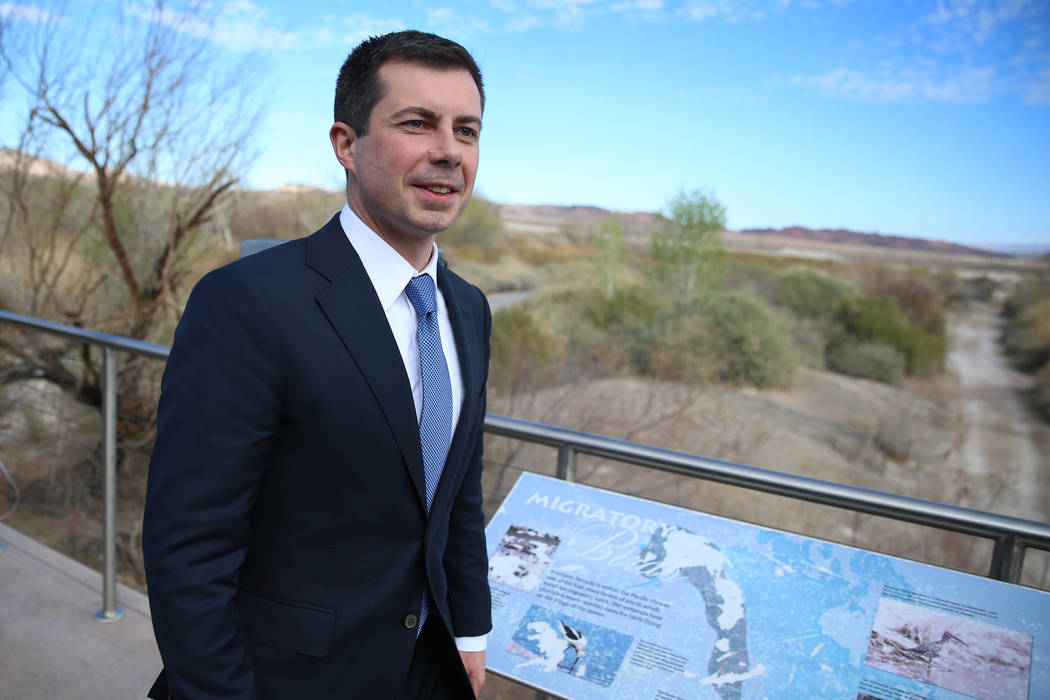 Pete Buttigieg leaves after participating during a roundtable discussion on Nevada public lands ...