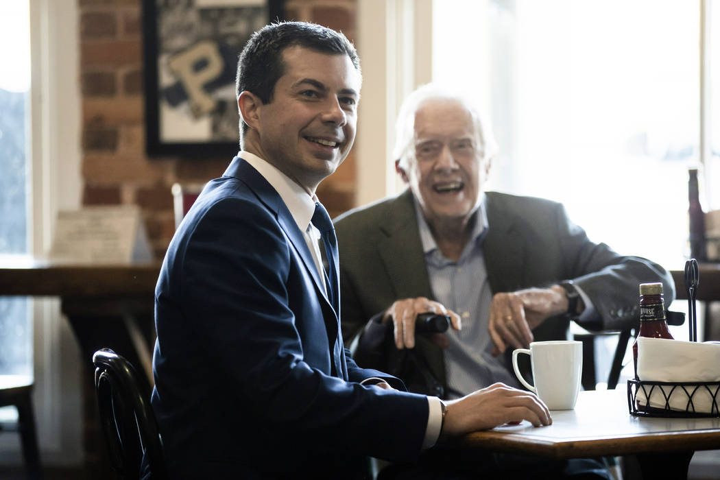 Democratic presidential candidate and former South Bend, Ind. Mayor Pete Buttigieg, left, meets ...