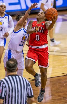UNLV Lady Rebels guard LaTecia Smith (0, right) looks to lay in the ball over San JosŽ St ...
