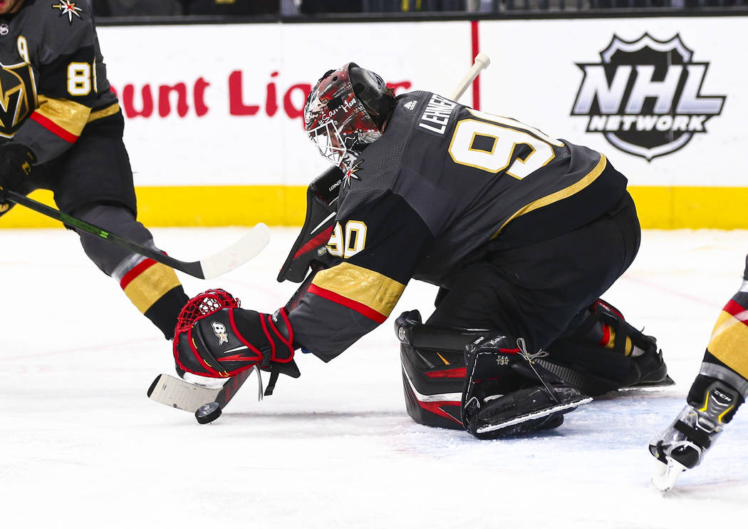 Golden Knights goaltender Robin Lehner (90) stops the puck during the second period of an NHL h ...