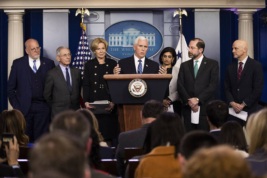 Vice President Mike Pence, center, with, from left, Director of the Centers for Disease Control ...
