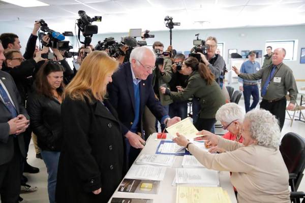 Democratic presidential candidate Sen. Bernie Sanders, I-Vt., arrives to vote in the Vermont Pr ...