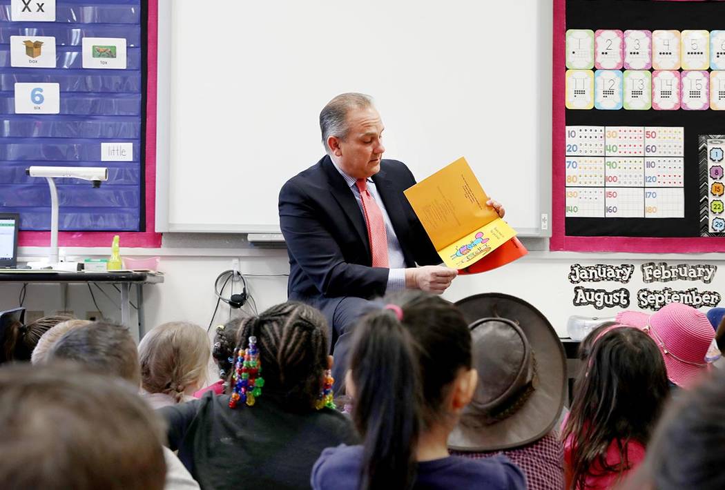 Clark County School District superintendent Dr. Jesus Jara reads to a kindergarten class for r ...