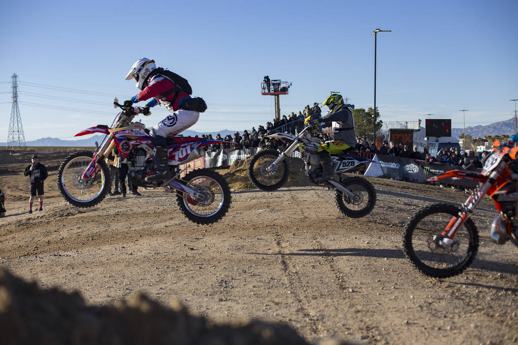 Racers start in the motorcycle race in the Mint 400 in Primm, Nevada, Saturday, March 9, 2019. ...