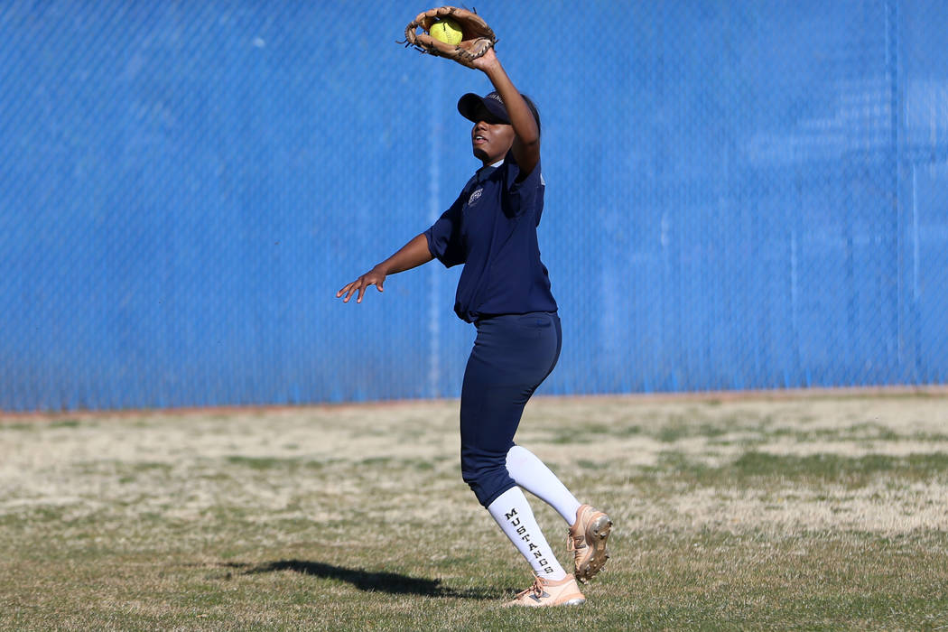 Shadow Ridge's Jasmine Martin, 17, catches the ball during a softball practice at Shadow Ridge ...