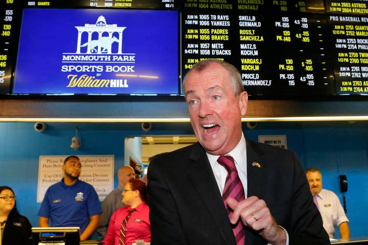 New Jersey Governor Phil Murphy, arrivers to make the first wager with Monmouth Park Sports Boo ...