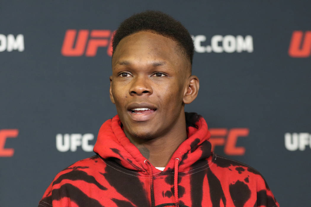 UFC middleweight champion Israel Adesanya speaks during a press conference at the UFC Apex in L ...