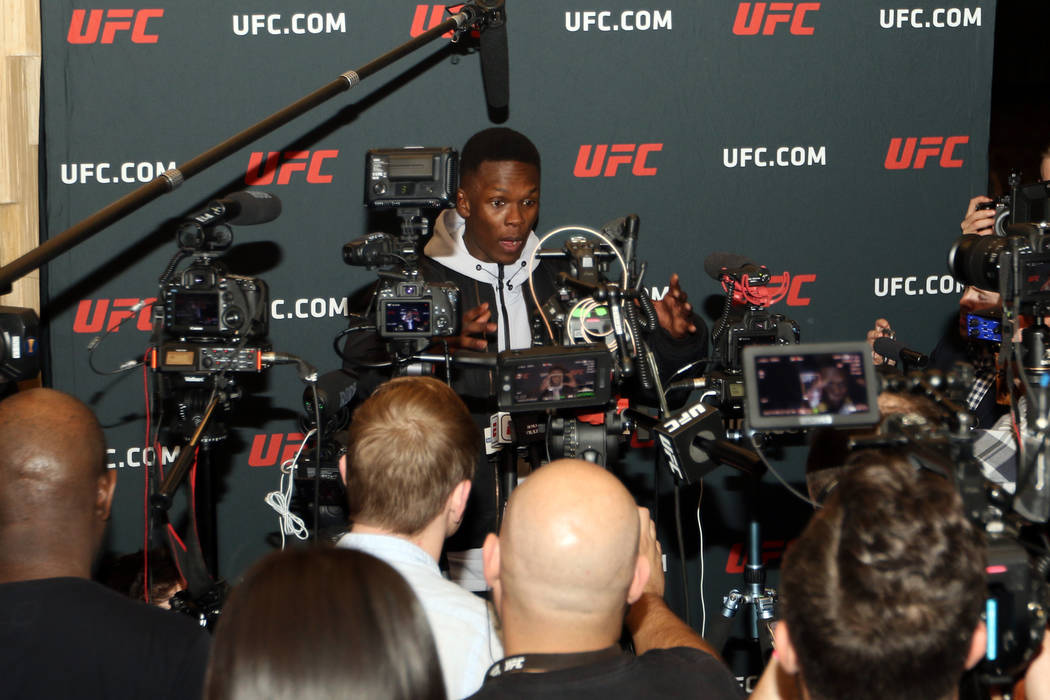 UFC middleweight champion Israel Adesanya speaks during a press conference at the UFC 248 open ...