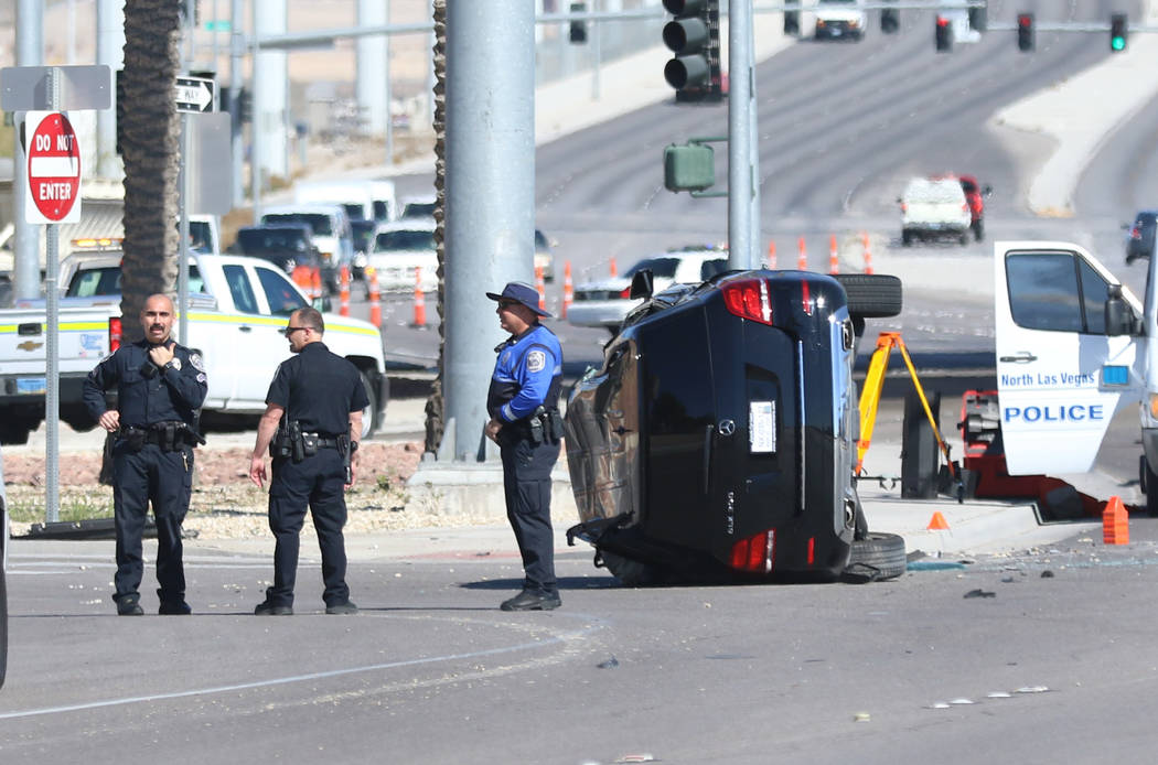 North Las Vegas police investigate a police shooting near Lamb Boulevard and Interstate 15 on W ...