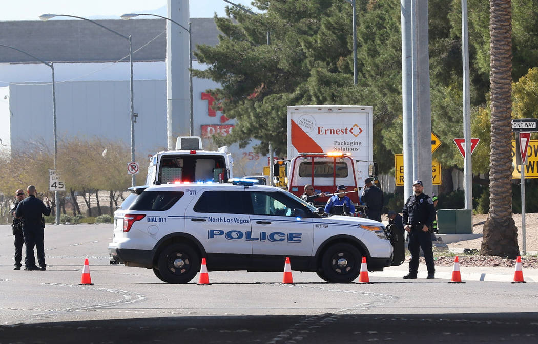 North Las Vegas police investigate a police shooting near Lamb Boulevard and Interstate 15 on W ...