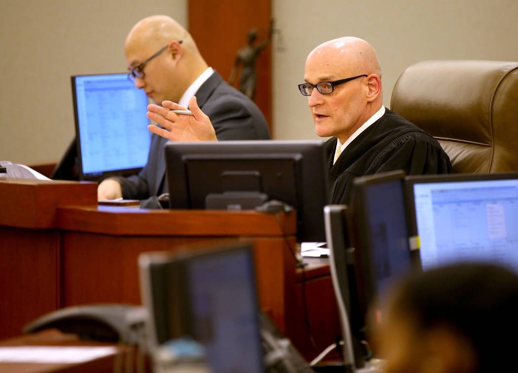 Clark County District Judge Rob Bare presides during a hearing at the Regional Justice Center i ...