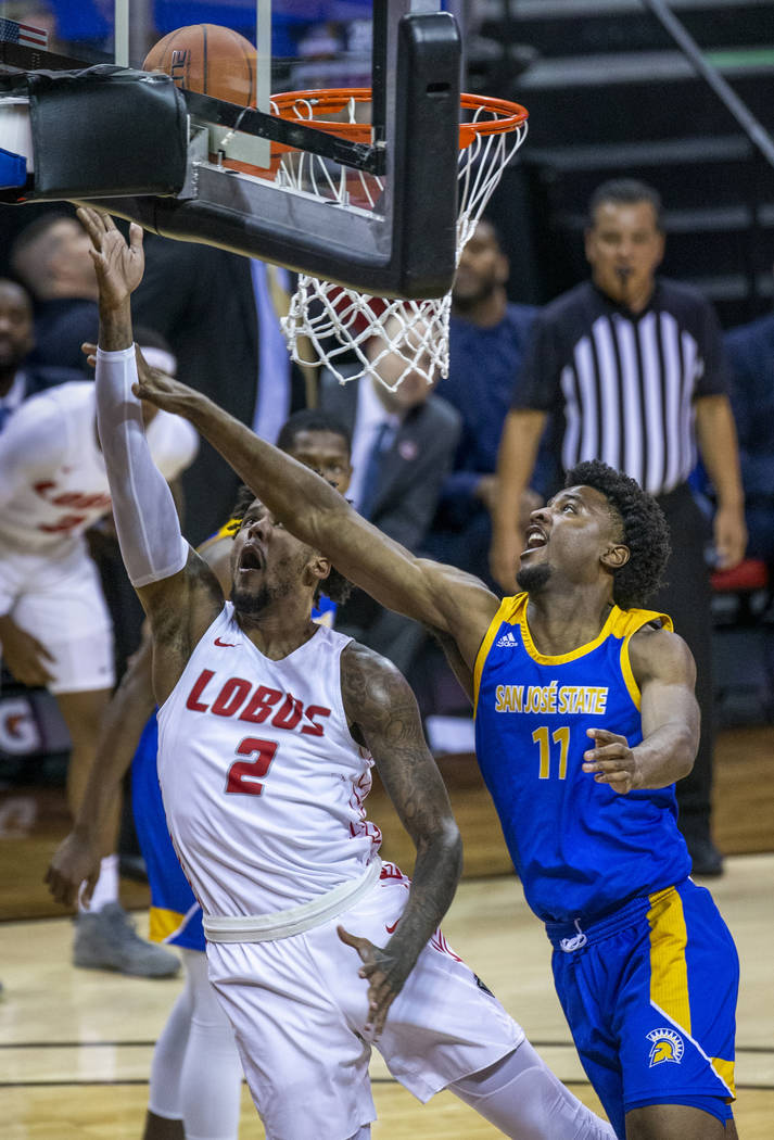 New Mexico Lobos guard Vance Jackson (2, left) gets inside of San Jose State Spartans forward C ...