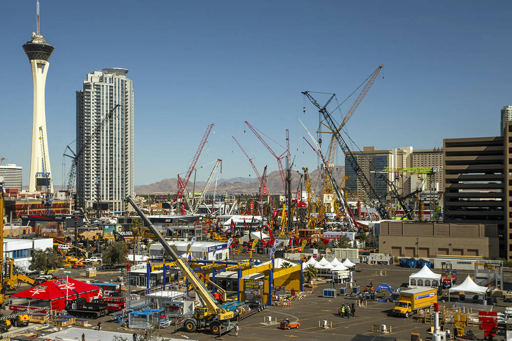 Numerous construction cranes and equipment are in place for the upcoming CONEXPO-CON/AGG event ...