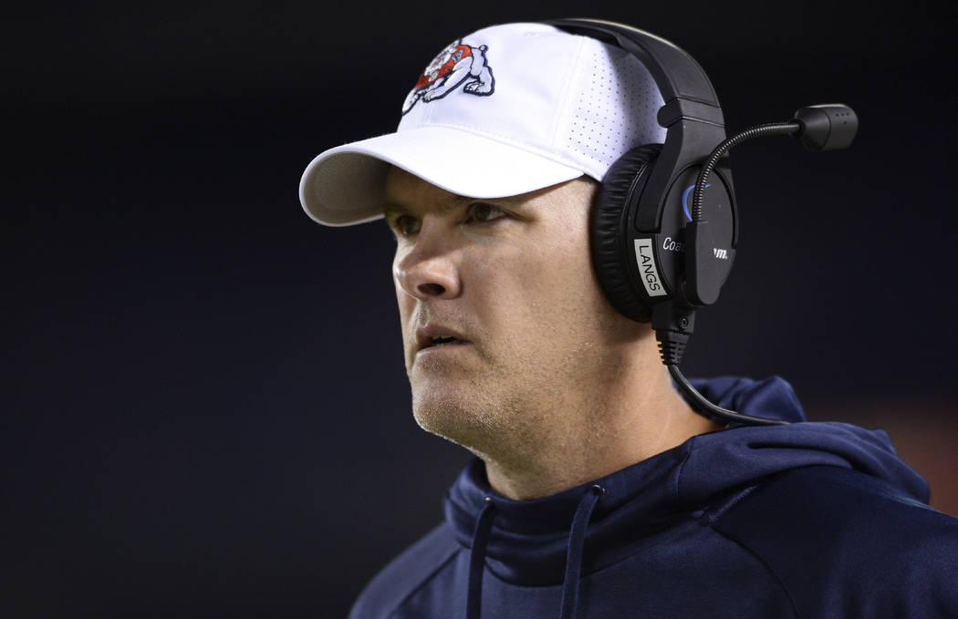 Fresno State Bulldogs quarterbacks coach Danny Langsdorf looks on from the sideline during the ...