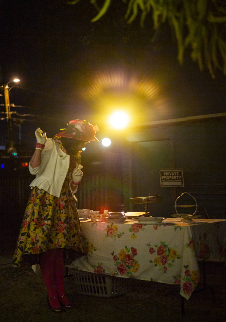 Rose Aster, played by Natalie Senecal, prepares tea for attendees during a dress rehearsal of & ...