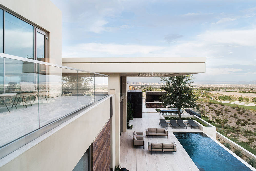 The terrace in back is geometrically structured and multileveled. (Stephen Morgan)