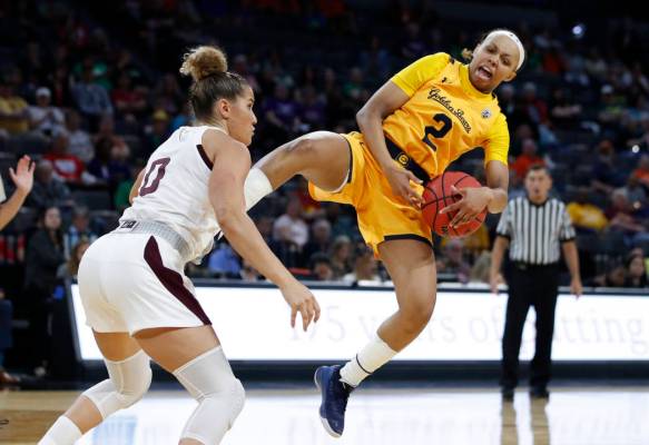 Arizona State's Taya Hanson (0) attempts to steal the ball from California's Cailyn Crocker (2) ...