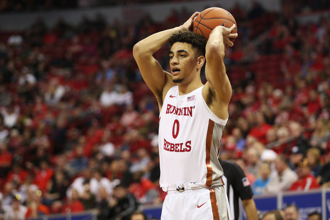 UNLV Rebels guard Jay Green (0) looks for an open pass against Boise State Broncos during the f ...