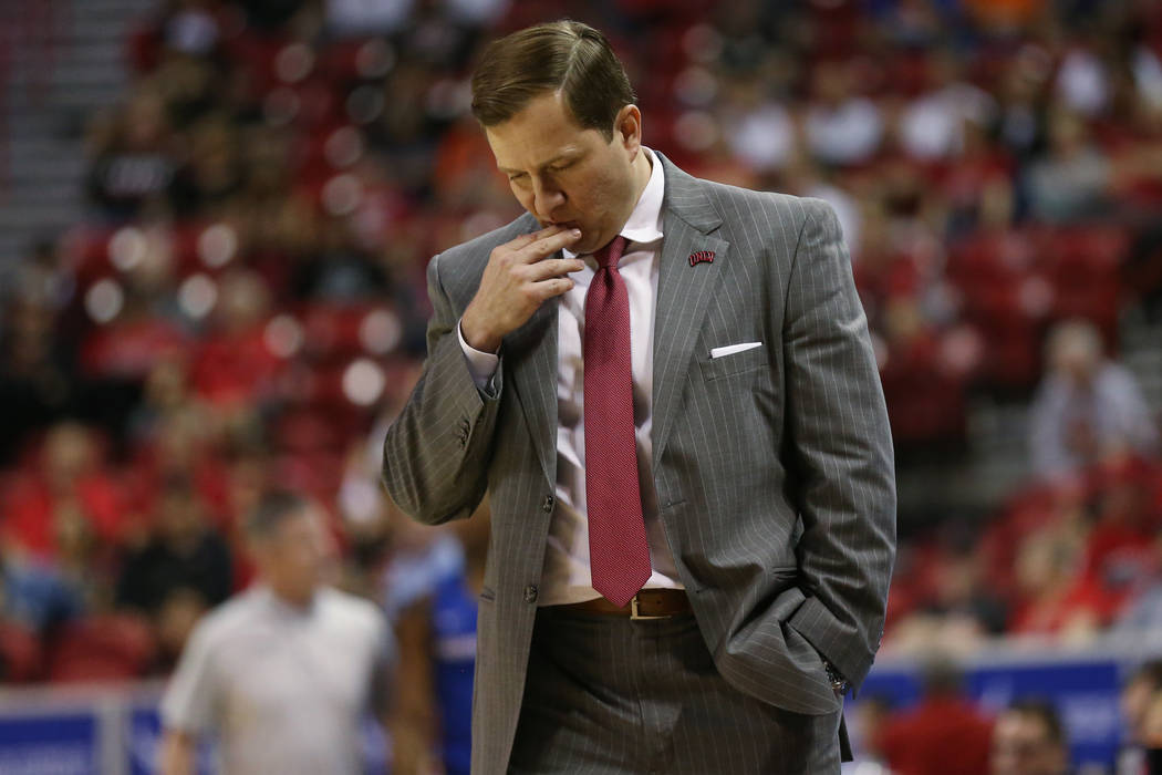 UNLV Rebels head coach T. J. Otzelberger reacts after a play against Boise State Broncos during ...