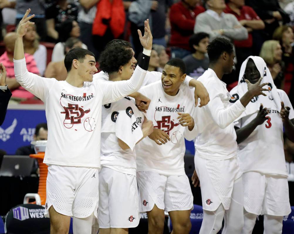 The San Diego State bench reacts during the second half of the team's NCAA college basketball g ...