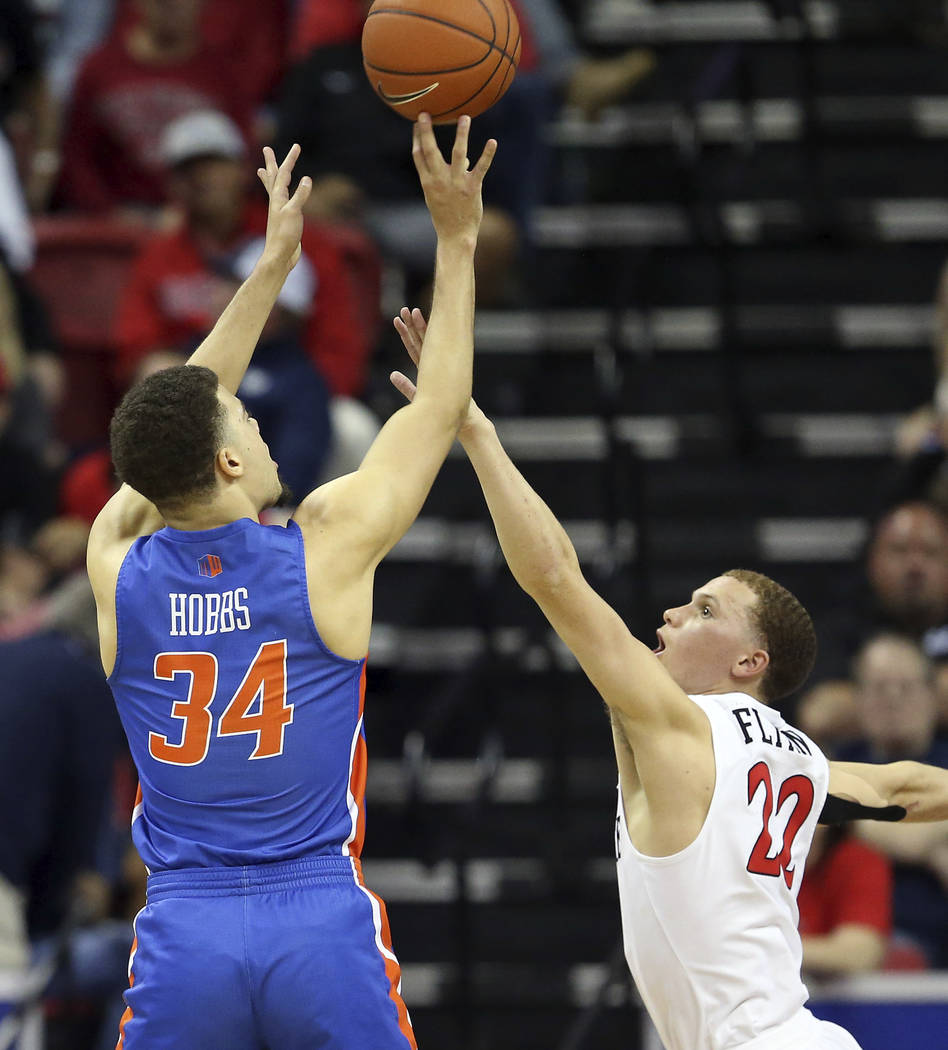 Boise State's Alex Hobbs (34) shoots as San Diego State's Malachi Flynn (22) defends during the ...