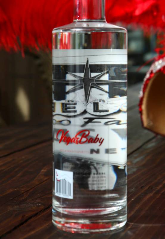 The back side of bottle of Vegas Baby Vodka, showing an inner label with a picture, in Las Vega ...