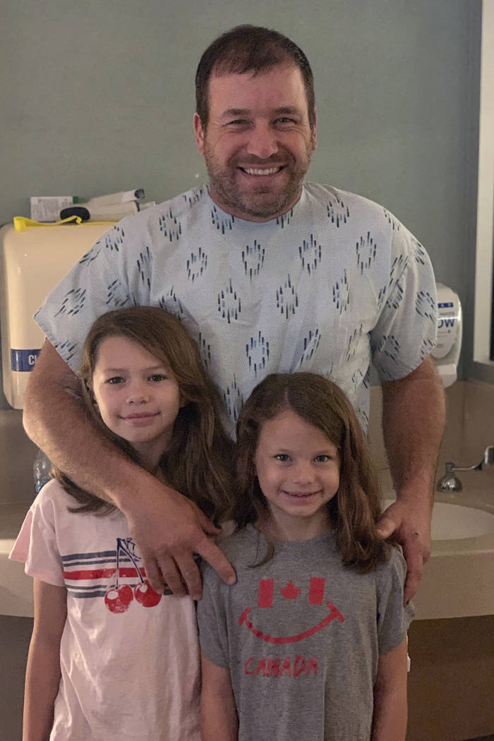 This undated photo provided by Roush Racing shows NASCAR driver Ryan Newman and his daughters, ...