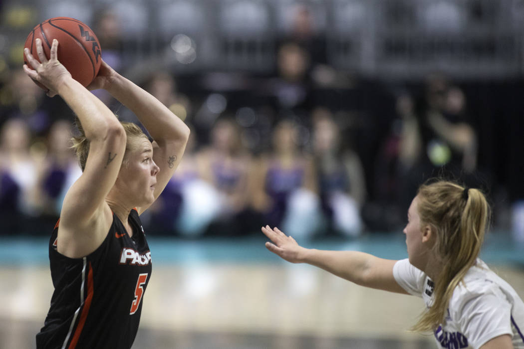 University of the Pacific's Sophie Tryggedsson (5) looks to pass as University of Portland's gu ...
