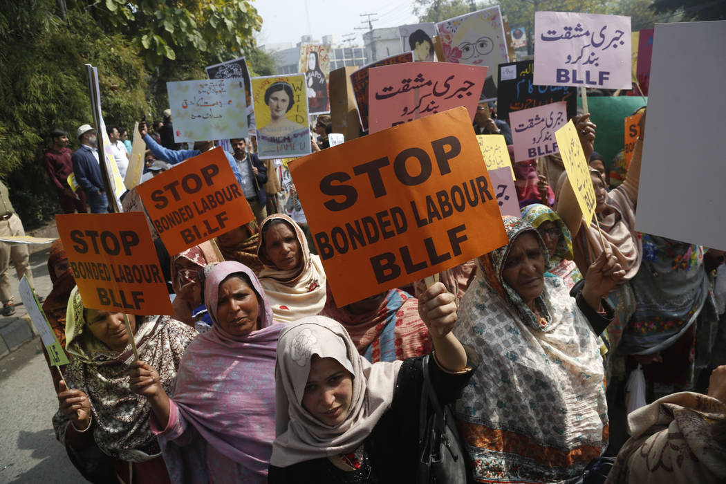 Pakistani activists take part in an International Women's Day rally in Lahore, Pakistan, Sunday ...