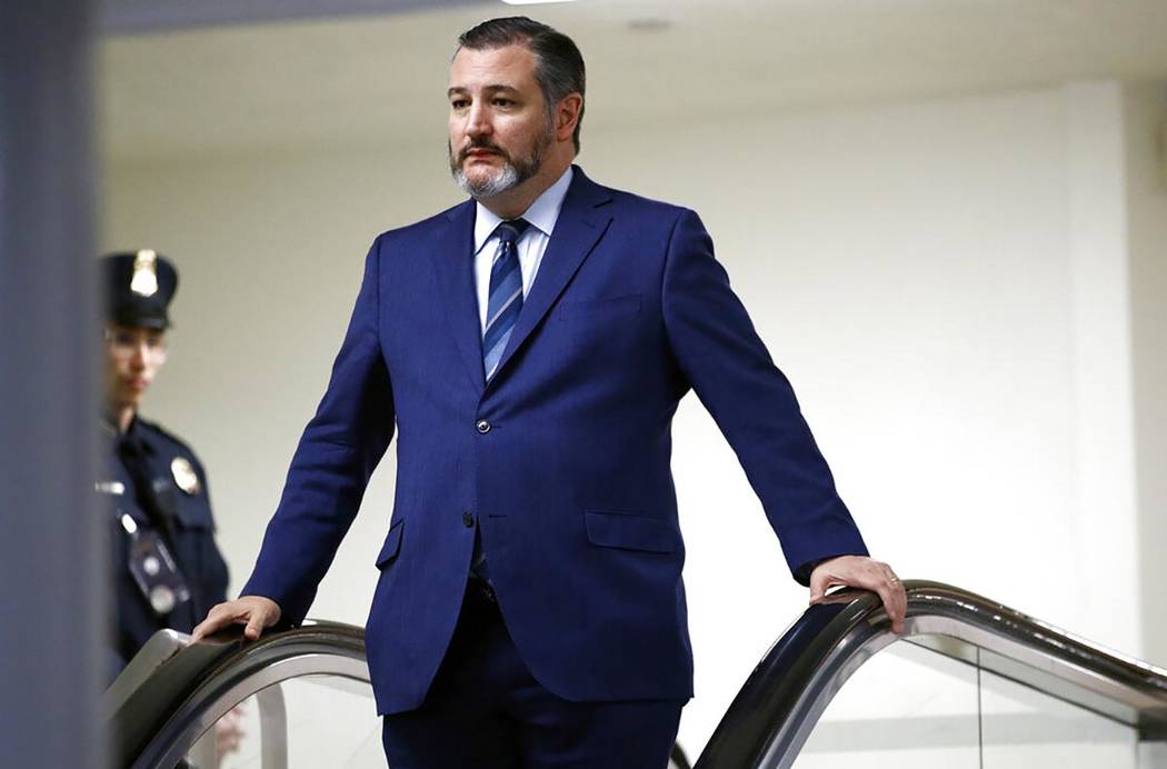 In a Jan. 29, 2020, file photo, Sen. Ted Cruz, R-Texas, rides an escalator before speaking with ...