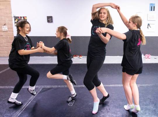 Makayla Patterson, left, Alli Kano, Cian Monaghan and Maren Smith practice at Scoil Rince Ni R ...