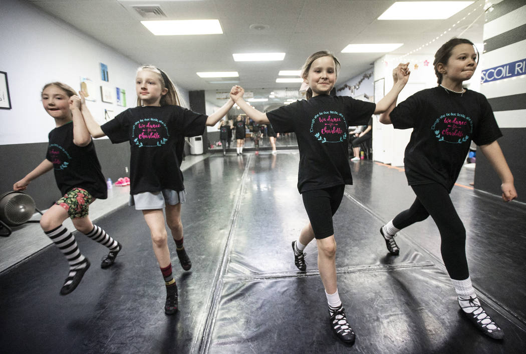 Lily Ulate, left, Annabell Hilliard, Alli Kano and Makayla Patterson practice at Scoil Rince Ni ...