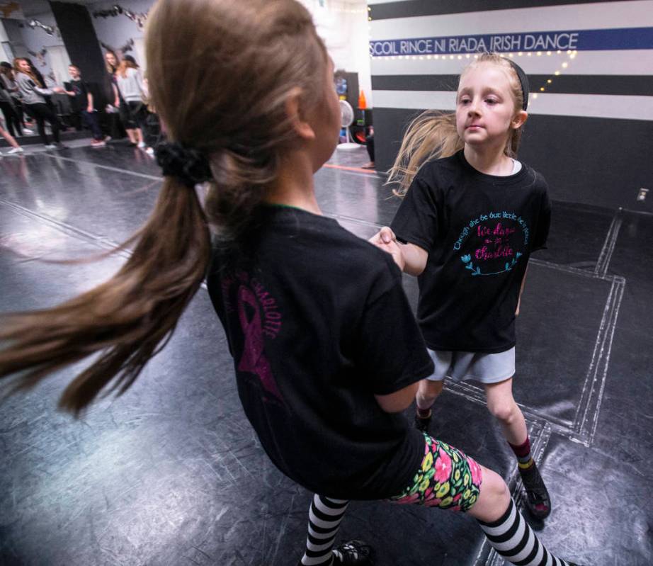 Annabell Hilliard, right, and Lily Ulate practice at Scoil Rince Ni Riada Irish Dance on Wednes ...