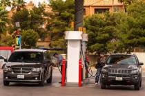 Patrons pump gas at a station on Flamingo Road at Koval Lane on Monday, April 15, 2019, in Las ...