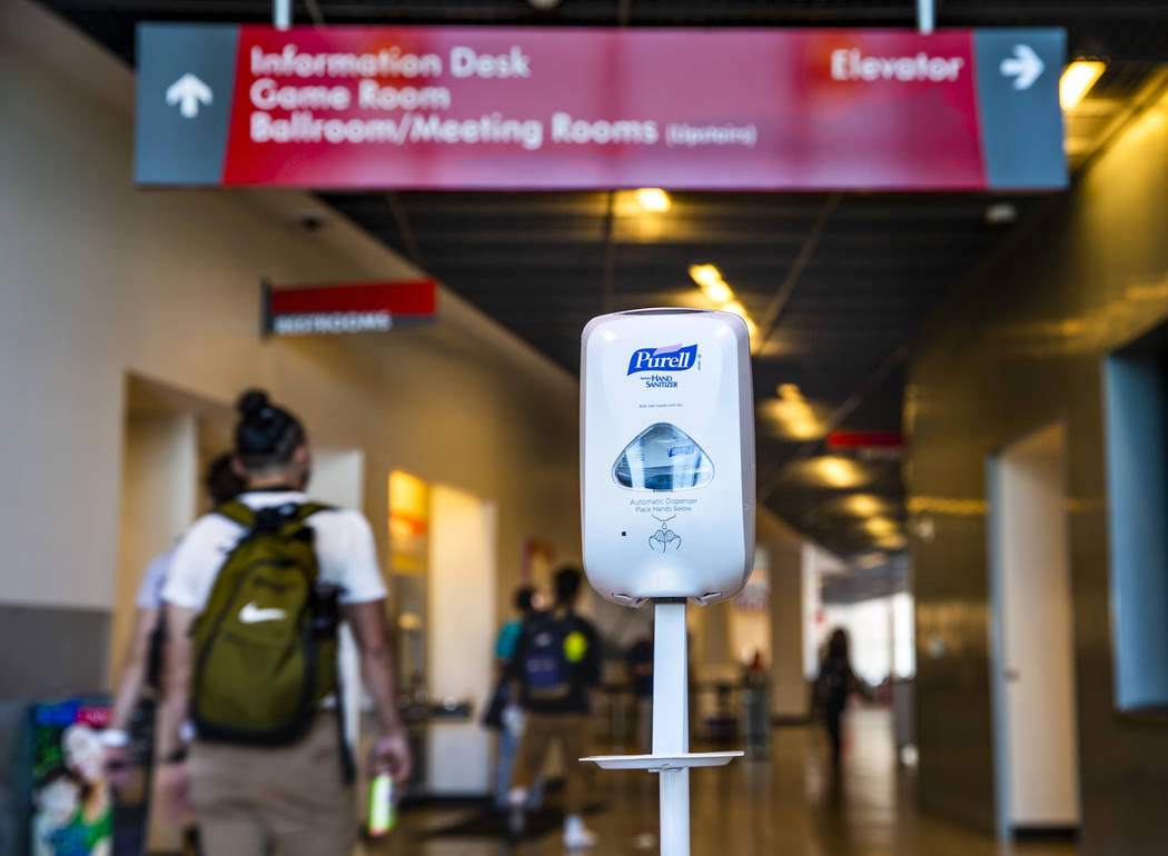 A hand sanitizer dispenser is installed for use at the entrance to the UNLV Student Union build ...